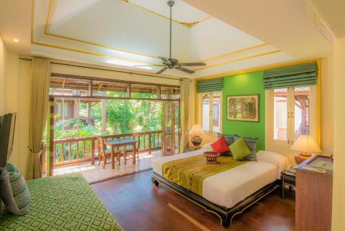 Postel nebo postele na pokoji v ubytování Rabbit Resort Pattaya