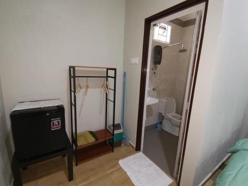 Ванная комната в Faris's Homestay & Resort