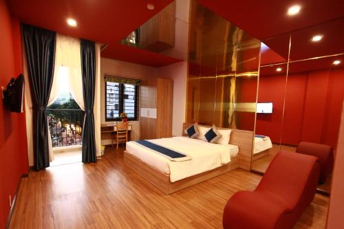Giường trong phòng chung tại Mata Love Hotel