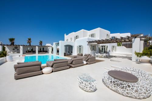 a rendering of a villa with a swimming pool at Diles Villas & Suites Mykonos in Tourlos