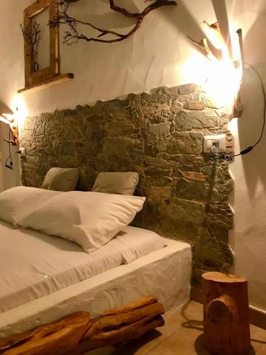Ein Bett oder Betten in einem Zimmer der Unterkunft I Ginepri