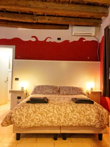 Postel nebo postele na pokoji v ubytování Loggiato Tassis Charme&Relax
