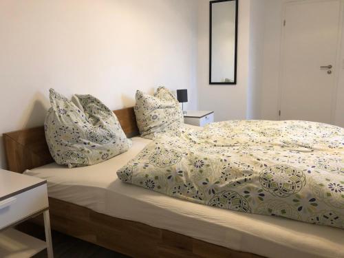 En eller flere senge i et værelse på Pension Jägerschenke