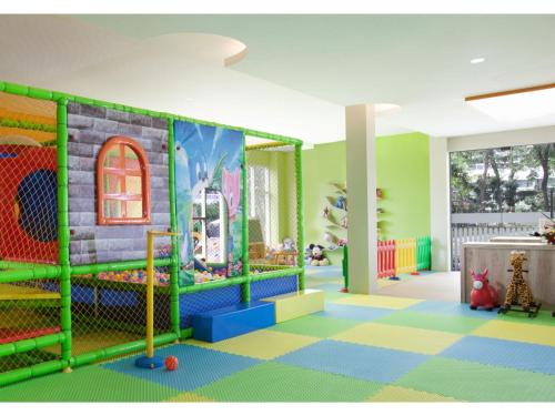 a room with a playroom with a play equipment at Royal Ambarrukmo Yogyakarta in Yogyakarta