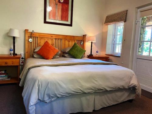Кровать или кровати в номере Bredon Cottage