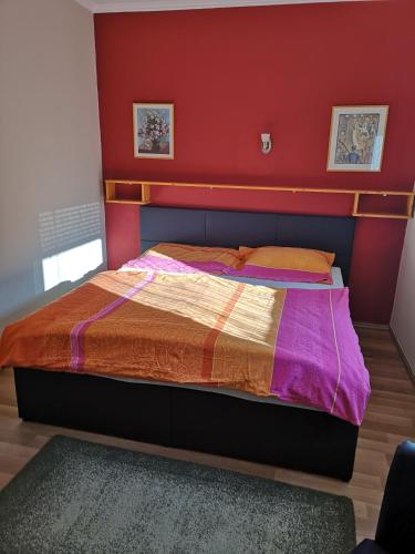 Postel nebo postele na pokoji v ubytování Fortuna Apartman