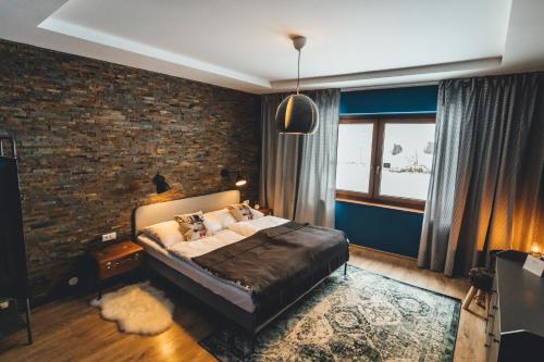 Postel nebo postele na pokoji v ubytování Hotel Sportalm - Adults Only Boutique Hotel
