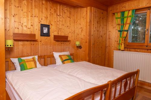 Una cama o camas en una habitación de Appartement Chantilu