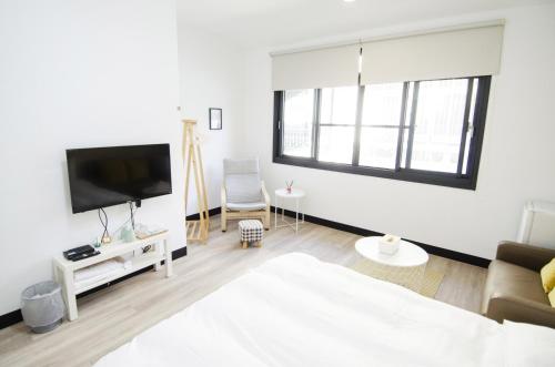 Μια τηλεόραση ή/και κέντρο ψυχαγωγίας στο TT Guesthouse旅人時光民宿