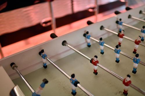 a group of toy people standing in a gym at Hôtel Arles Plaza in Arles