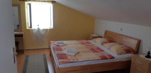 Postel nebo postele na pokoji v ubytování Studio Apartment Milica