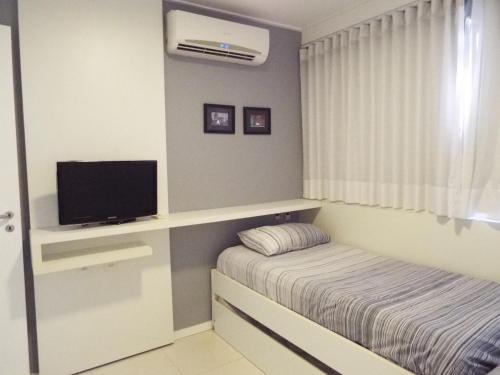 Postel nebo postele na pokoji v ubytování Barra Bali Beach Service - Apto 114