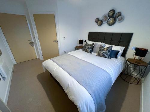 Katil atau katil-katil dalam bilik di Station Side Penthouse