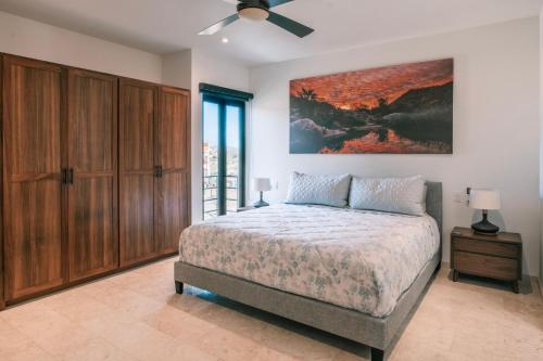 Ένα ή περισσότερα κρεβάτια σε δωμάτιο στο Cerritos Surf Residences