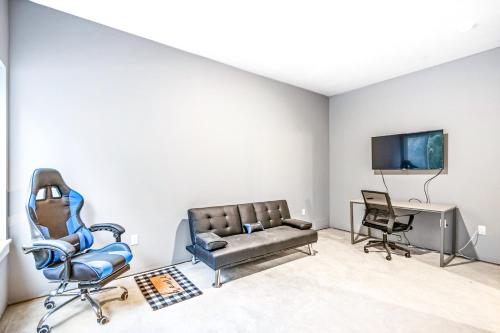 a living room with a couch and two chairs at Eagles Nest in Sagle