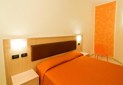 Katil atau katil-katil dalam bilik di Diano Sporting Apartments