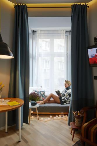 TV a/nebo společenská místnost v ubytování Courthouse Apartments Slavi