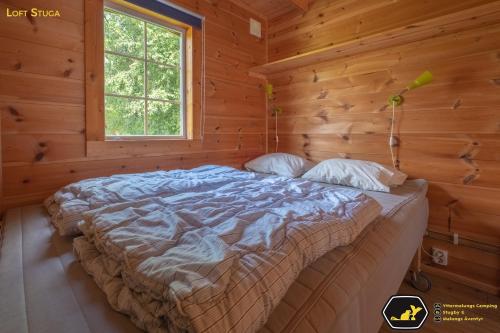 Postelja oz. postelje v sobi nastanitve Yttermalungs Camping
