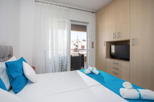 Llit o llits en una habitació de Fashionable Luxury Apartments