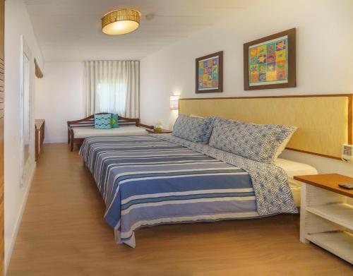 Postel nebo postele na pokoji v ubytování Hotel Via dos Corais