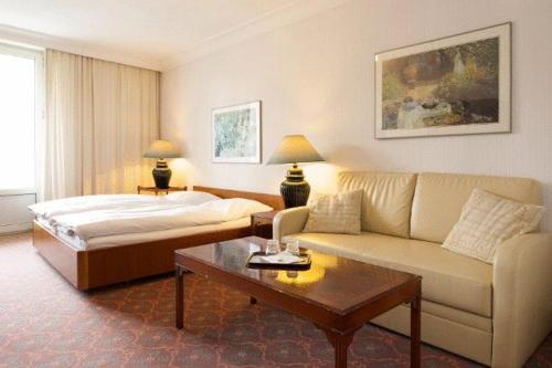 Postel nebo postele na pokoji v ubytování Hotel Behrmann