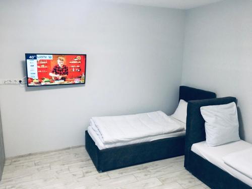Μια τηλεόραση ή/και κέντρο ψυχαγωγίας στο APARTMENT EDELWEISS