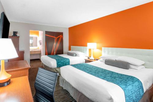 Katil atau katil-katil dalam bilik di Howard Johnson by Wyndham St. George Hotel & Suites