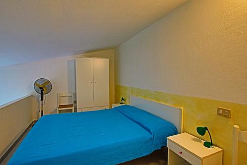 Llit o llits en una habitació de Residence Li Menduli