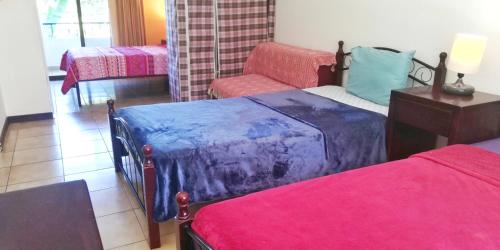 Ein Bett oder Betten in einem Zimmer der Unterkunft Vista Perfecta 2