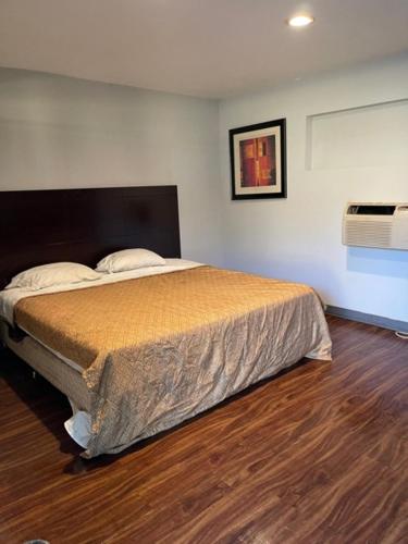 Posteľ alebo postele v izbe v ubytovaní Richmond Motel