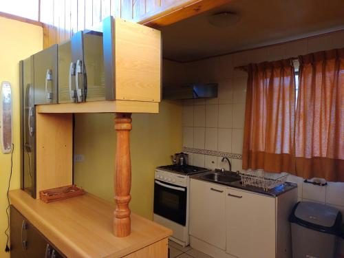 Η κουζίνα ή μικρή κουζίνα στο Cabañas Cadizmar