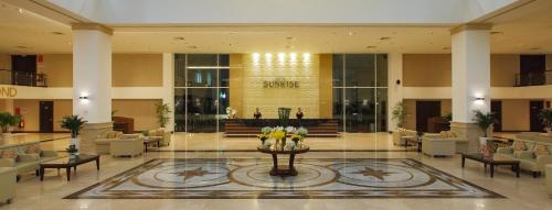 Χώρος καθιστικού στο Sunrise Hotel