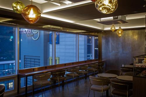 Restoran atau tempat lain untuk makan di Busan Lounge 26 Hotel
