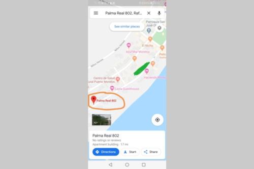 a screenshot of a google maps page on a phone at Modern 1 bedroom suite by beach Great location! in Puerto Morelos