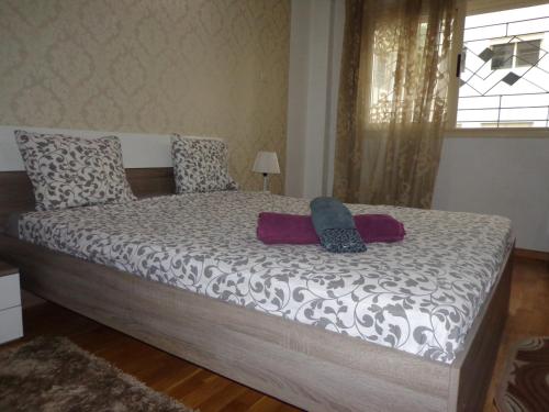 Ένα ή περισσότερα κρεβάτια σε δωμάτιο στο Apartment with Terrace