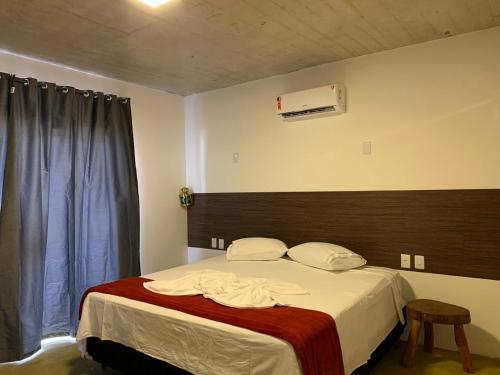 Posteľ alebo postele v izbe v ubytovaní Casa Amarela - 3 suítes e piscina