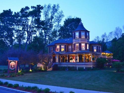a large house with a tower on top of it at The Fairlawn Inn in Hunter