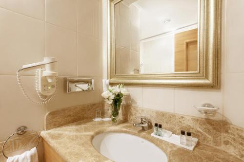 Ванная комната в Отель Милан