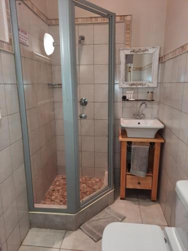 Ванная комната в Villa Beryl Guesthouse