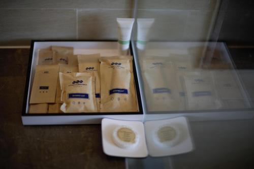 a display case with a bunch of toilet paper at FLC Grand Hotel Quy Nhon in Quy Nhon