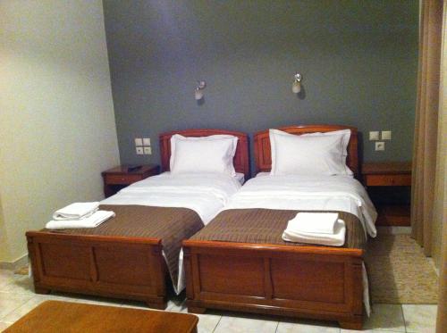 מיטה או מיטות בחדר ב-Villa C & C