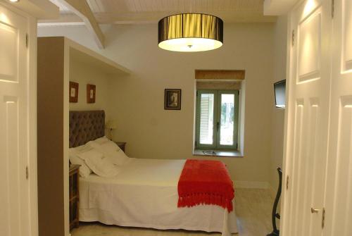 Letto o letti in una camera di Quinta de San Amaro Rias Baixas