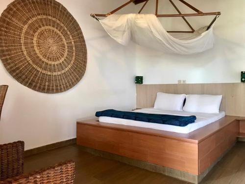 Postel nebo postele na pokoji v ubytování Boblin la Mer hotel restaurant plage