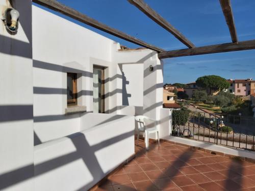 a view from the balcony of a house at Hotel il Faro di Molara in Porto San Paolo