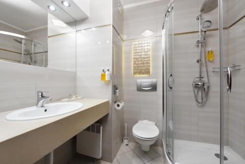 Koupelna v ubytování City Hotel