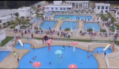 a rendering of a water park with people in it at Valle de leones in Cartagena