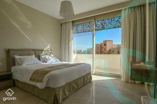 Ліжко або ліжка в номері Mangroovy Residence El Gouna - Grovin