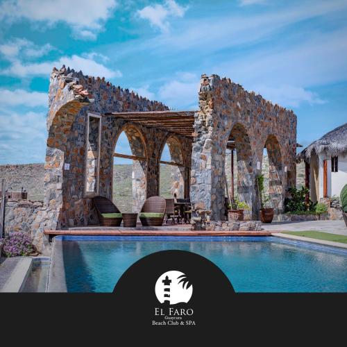 a stone house with a swimming pool at Guaycura Boutique Hotel, Beach Club & Spa in Todos Santos