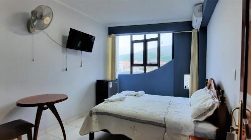 Кровать или кровати в номере Gran Hotel Palmeras