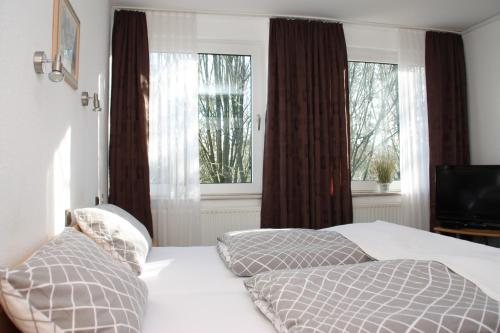Ένα ή περισσότερα κρεβάτια σε δωμάτιο στο Landhaus Riedel